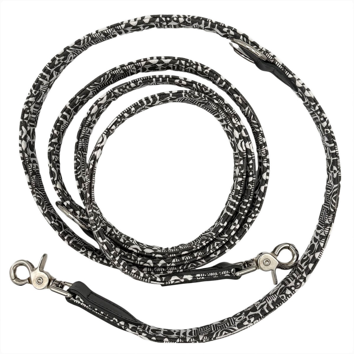 hw-dog-0001_Hands Free Dog Lead_02sd copy Hiro + Wolf Bow Wow Haus Hands-Free Dog Lead in black and white geometric print, extra-long adjustable design with multiple clip connection points, shown coiled on a white background.