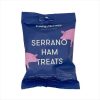 Blue Buddylicious Serrano Ham Treats dog snack bag with pink pig illustrations and white text, natural semi-moist treats rich in omega oils – EdenWave.