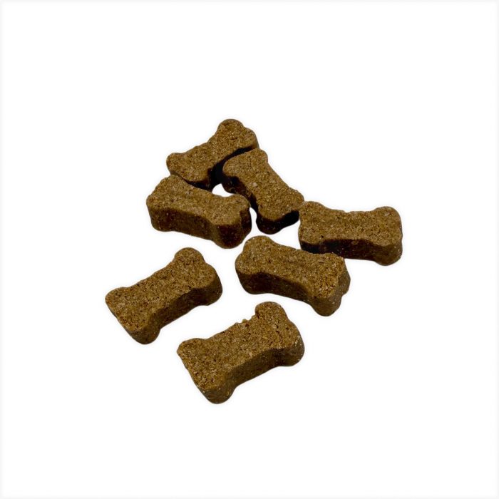 Bone-shaped Buddylicious Serrano Ham dog treats on white background, approx. 2.5 × 1 × 1 cm each — semi-moist, natural, and rich in omega oils – EdenWave.