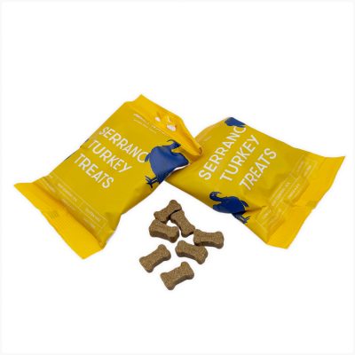 Two yellow Buddylicious Serrano Turkey Treats bags with bone-shaped semi-moist treats on white background – natural, hypoallergenic, and rich in omega oils – EdenWave.